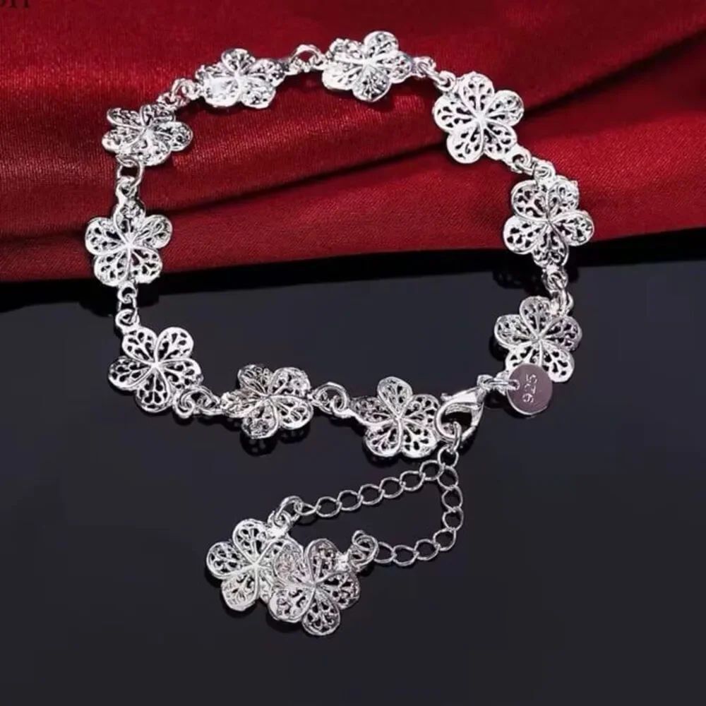 The Boho Flower sterling silver bracelet with dangling flowers